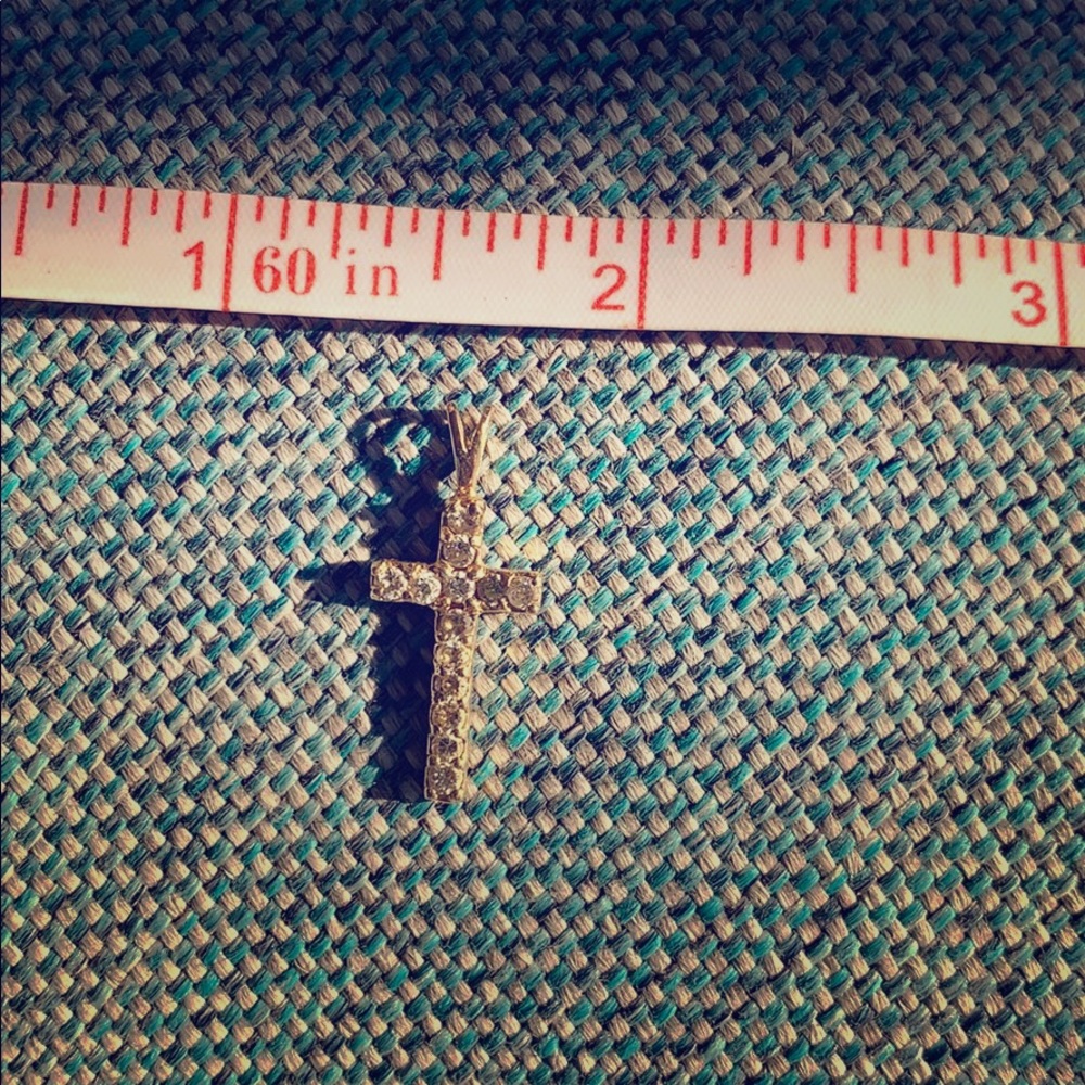 Gold and diamond cross charm